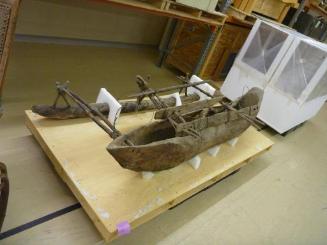 Bow view of the single outrigger in storage