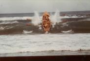 FLYING FISH IV taking a wave