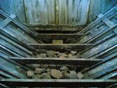 A view of the interior of ANTONIA's hold including  the loose stone  ballast.