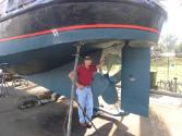 GLADSTONE has the convex stern shape over the propeller that is typical of tugs. 