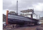 Repairs being made to the stem on OSCAR W around 2000