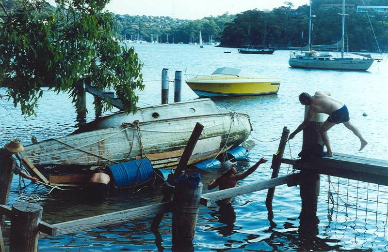 LADY FREDA being readied for towing, and showing the elegant canoe stern profile.