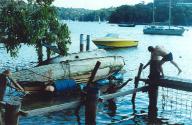 LADY FREDA being readied for towing, and showing the elegant canoe stern profile.